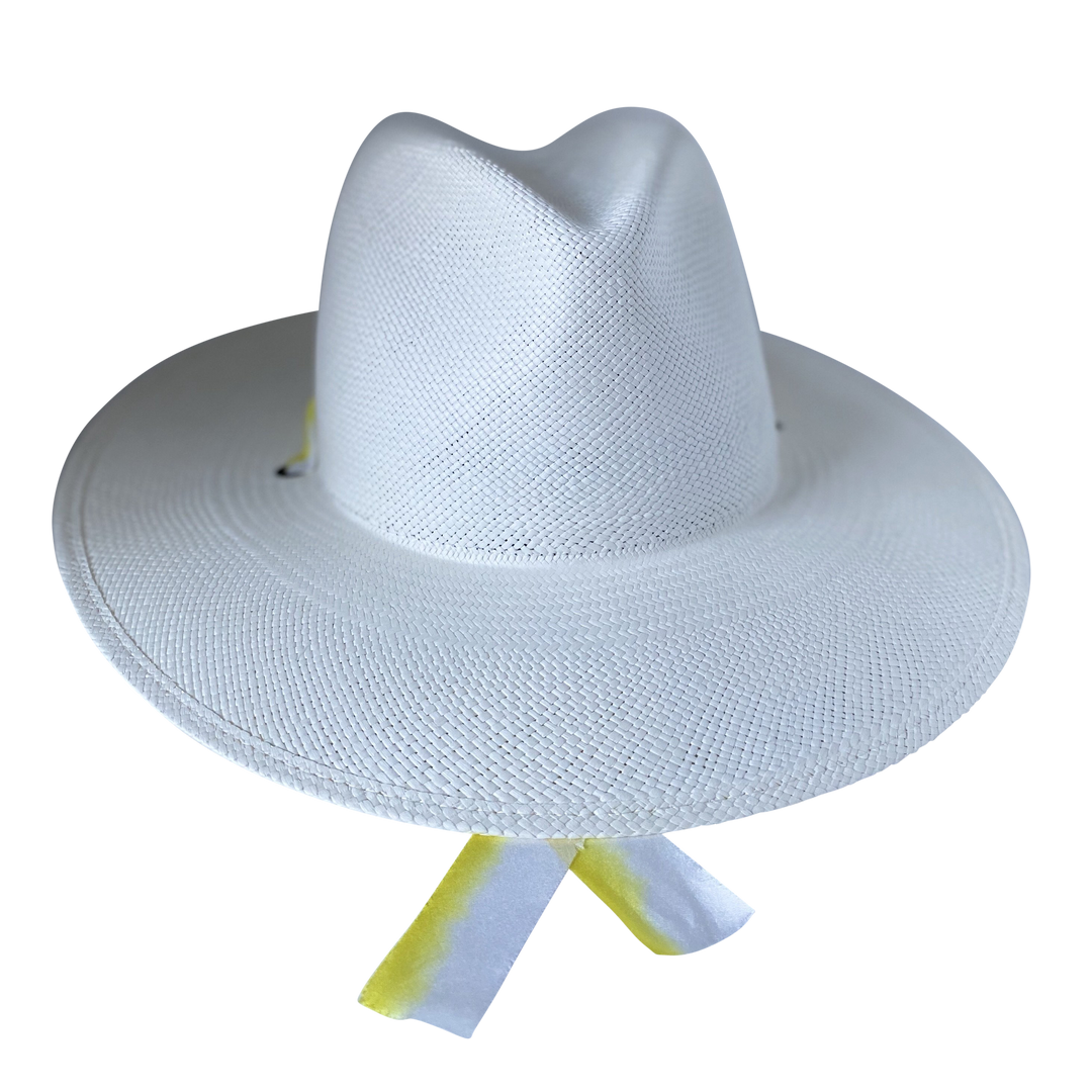 Khia Tullae The Siena white toquilla straw wide-brim hat with yellow and white silk drop-down ribbon, front product cutout