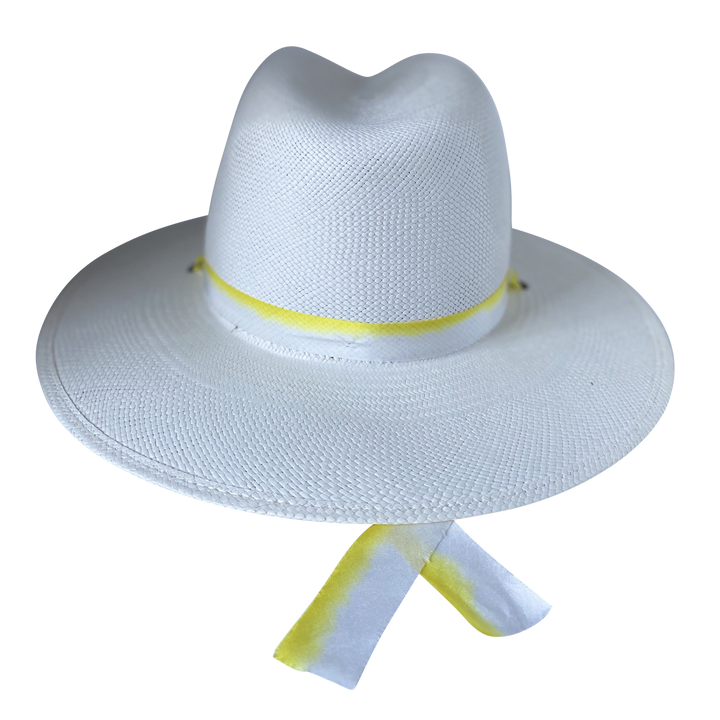 The Siena white toquilla straw wide-brim hat with yellow and white silk drop-down ribbon, back product cutout