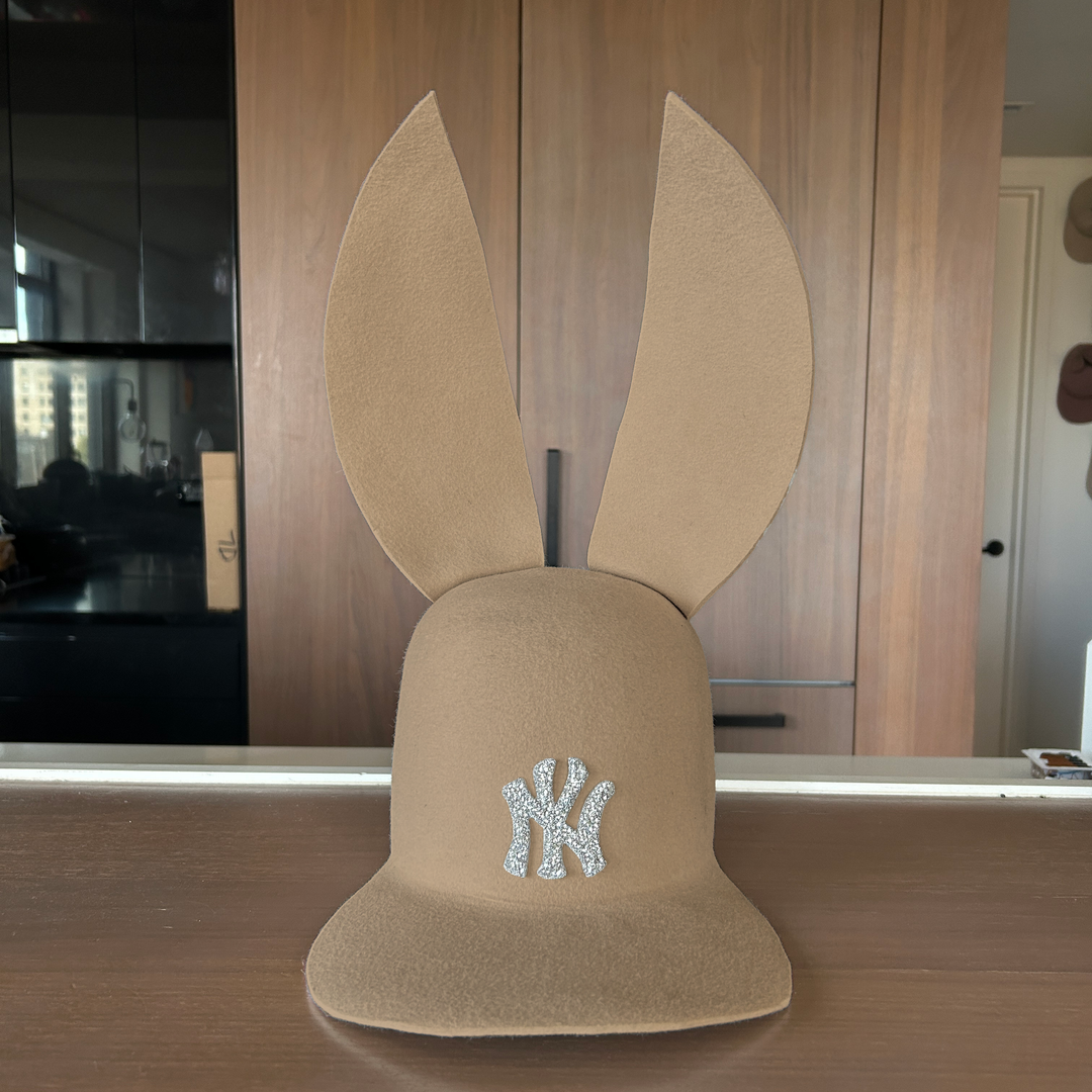 Khia Tullae The 212 Embellished Bunny Lid hat in sahara felt with NY patch embellished with rhinestones, front view