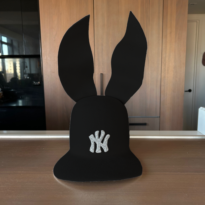 Khia Tullae The 212 Embellished Bunny Lid hat in black felt with NY patch embellished with rhinestones and waved ears, front view