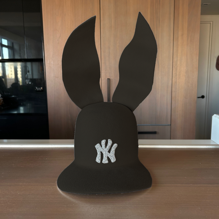 Khia Tullae The 212 Embellished Bunny Lid hat in olive felt with NY patch embellished with rhinestones and waved ears, front view