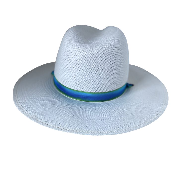 Khia Tullae The Amani white toquilla straw wide-brim hat with a blue and green tie-dye silk ribbon half band, back product cutout