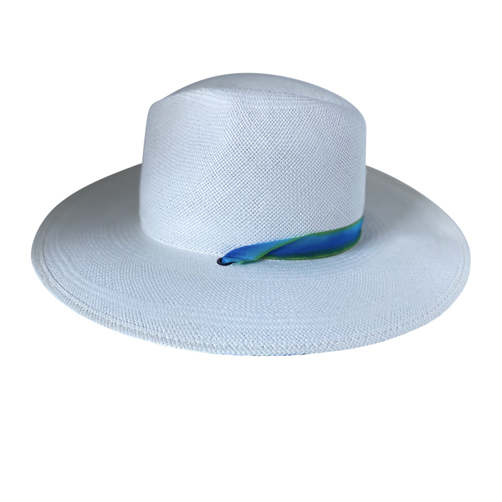 Khia Tullae The Amani white toquilla straw wide-brim hat with a blue and green tie-dye silk ribbon half band, right-side product cutout
