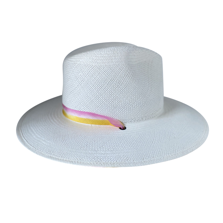 Khia Tullae The Bailey white toquilla straw wide-brim hat with a pastel pink and yellow silk ribbon half band, left-side product cutout