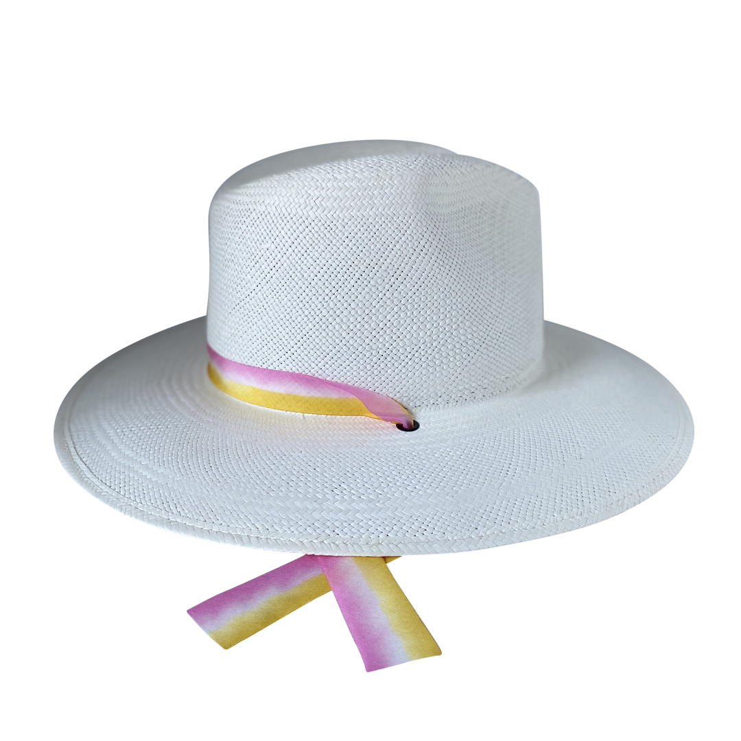 Khia Tullae The Bailey white toquilla straw wide-brim hat with yellow and pink drop-down silk ribbon ties, left product cutout