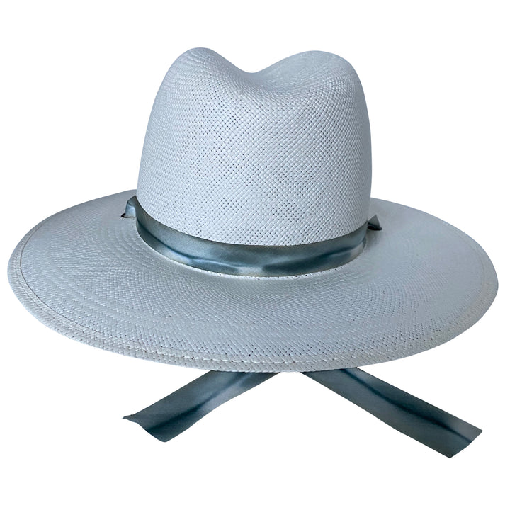The Bexley white toquilla straw wide-brim hat with blue-grey silk drop-down ribbon, back product cutout