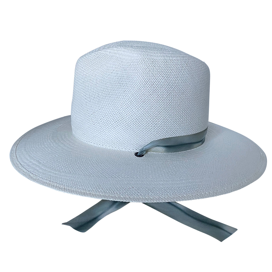 The Bexley white toquilla straw wide-brim hat with blue-grey silk drop-down ribbon, right-side product cutout