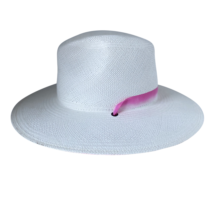 Khia Tullae The Brynn white toquilla straw wide-brim hat with a pastel pink tie-dye silk ribbon half band, right-side product cutout