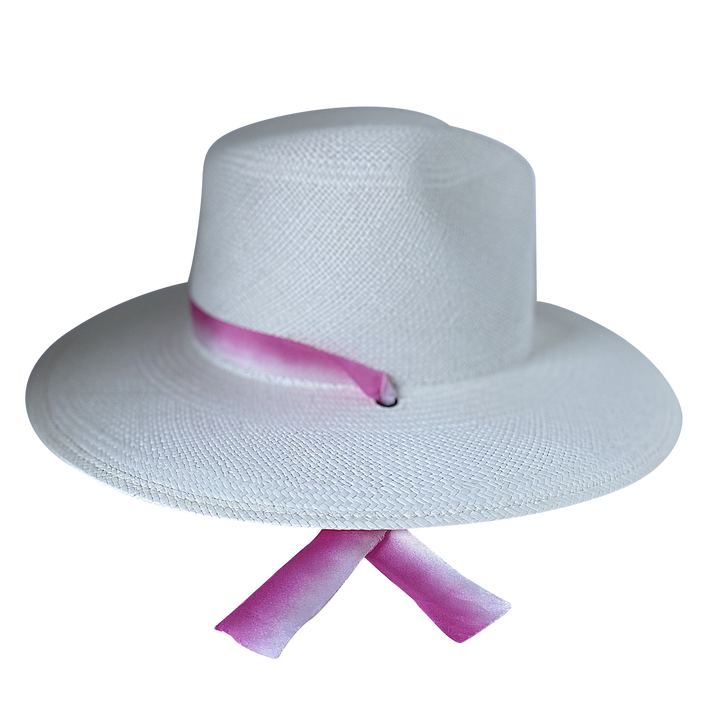 Khia Tullae The Brynn white toquilla straw wide-brim hat with pink and white silk drop-down ribbon, left-side product cutout