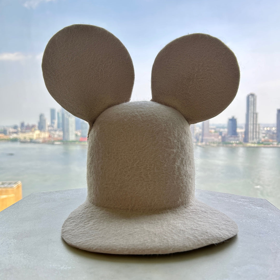 Khia Tullae The Calder Cap hat in bone felt, front view