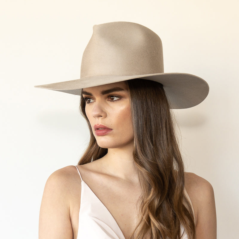 The Crosby mist wool wide-brim fedora, angled front left view on model