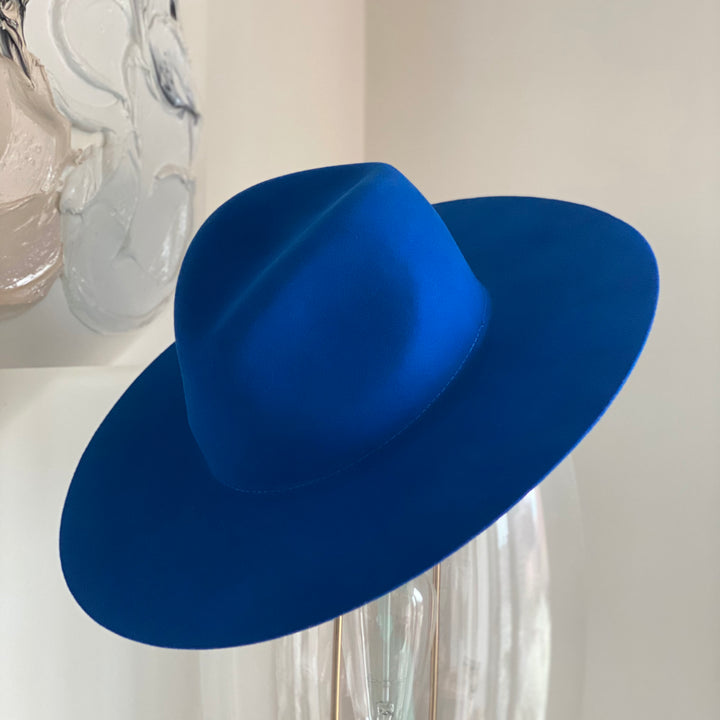 Khia Tullae The Dexta fedora in royal blue, 100% wool, angled view