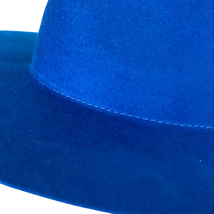 Detail view of Khia Tullae The Dexta fedora in royal blue 100% wool showing crown shaping and stitching and brim edge