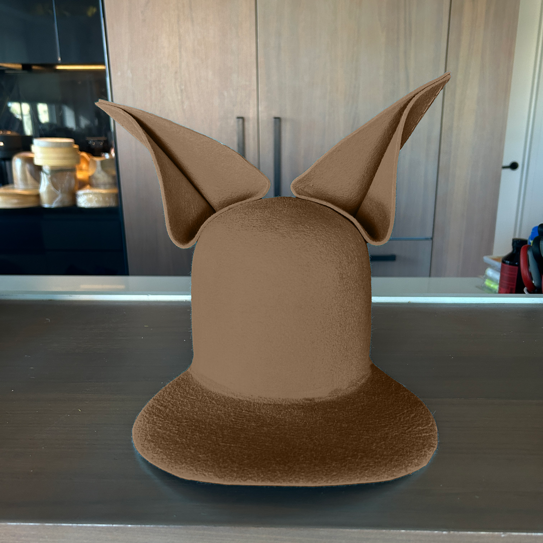 Khia Tullae The Foxy Lid hat in camel felt with folded bunny ears, front view