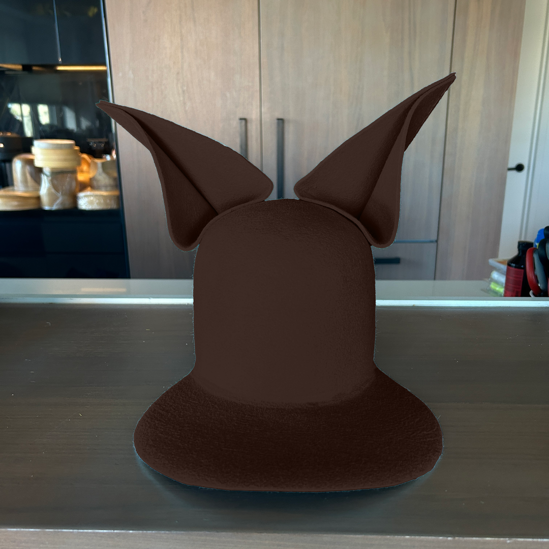 Khia Tullae The Foxy Lid hat in chocolate felt with folded bunny ears, front view