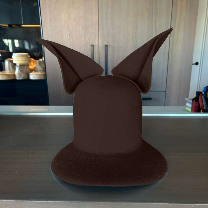 Khia Tullae The Foxy Lid hat in chocolate felt with folded bunny ears, front view