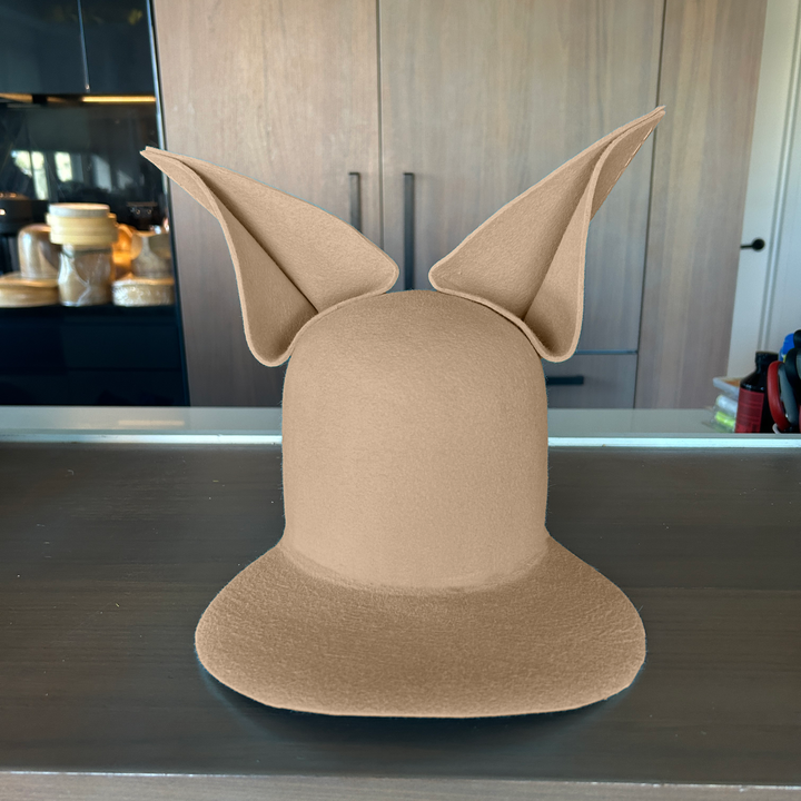 Khia Tullae The Foxy Lid hat in sahara felt with folded bunny ears, front view