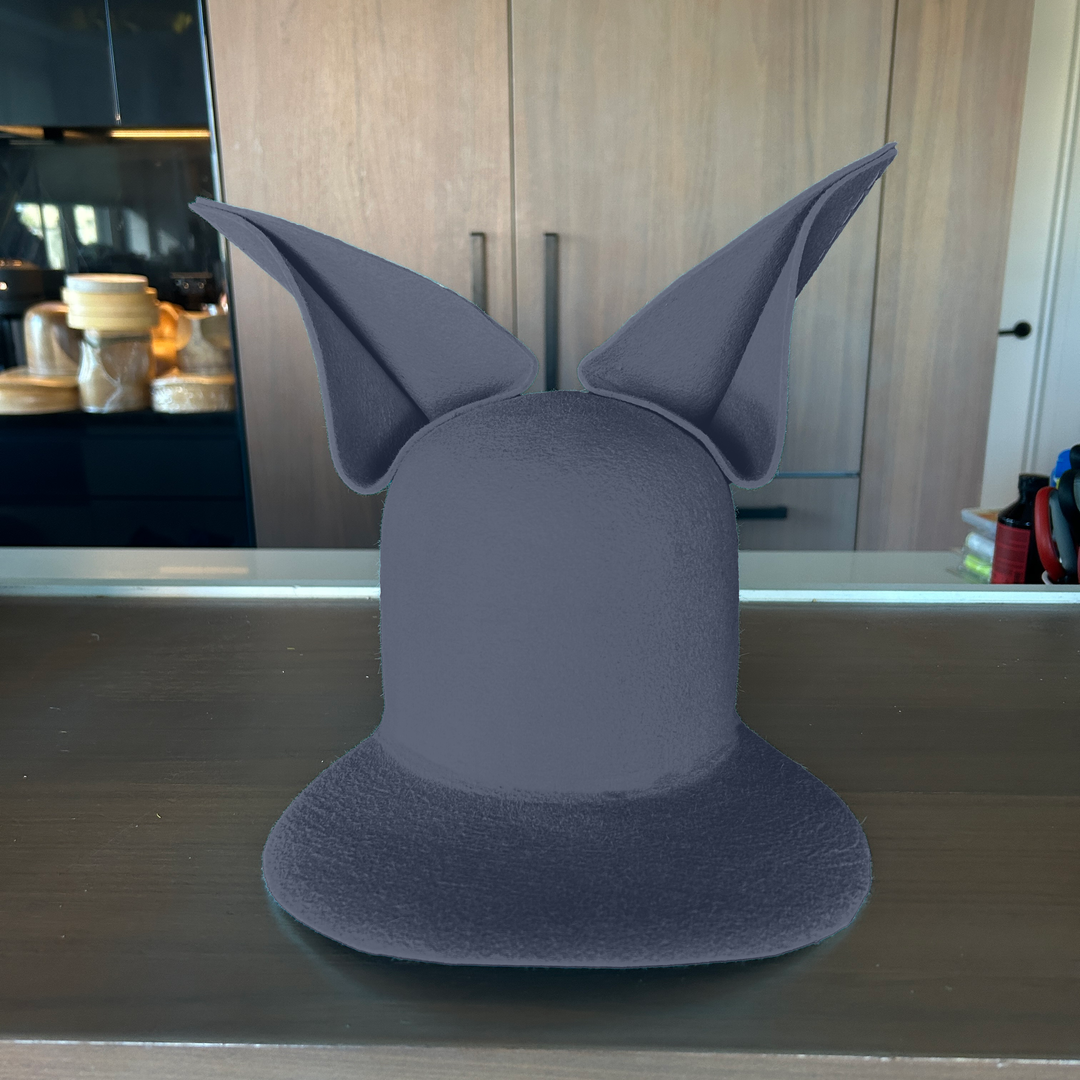 Khia Tullae The Foxy Lid hat in steel grey felt with folded bunny ears, front view
