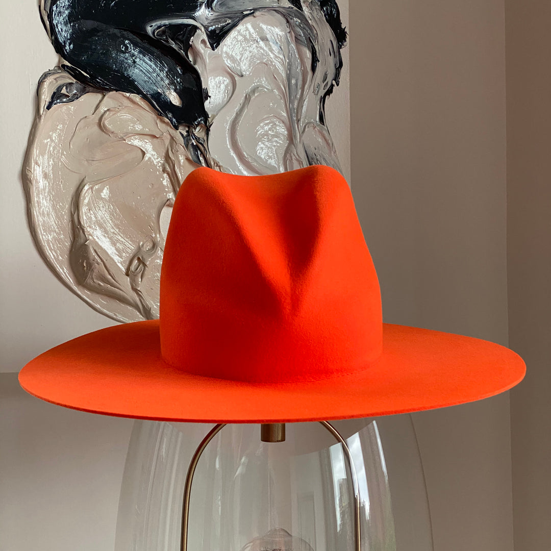 Khia Tullae The Hartley fedora in orange, 100% wool, front elevated view
