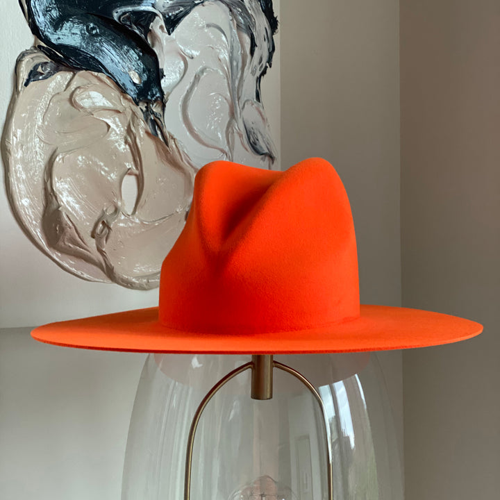 Khia Tullae The Hartley fedora in orange, 100% wool, front angled elevated view