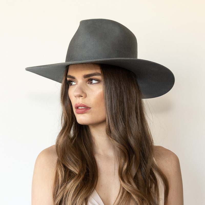 Khia Tullae The Irving ash grey wool wide-brim fedora, angled front left view on model