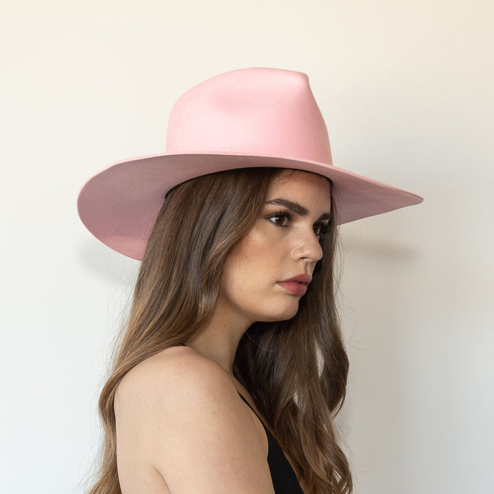Khia Tullae The Lex pink wool wide-brim fedora, side view on model