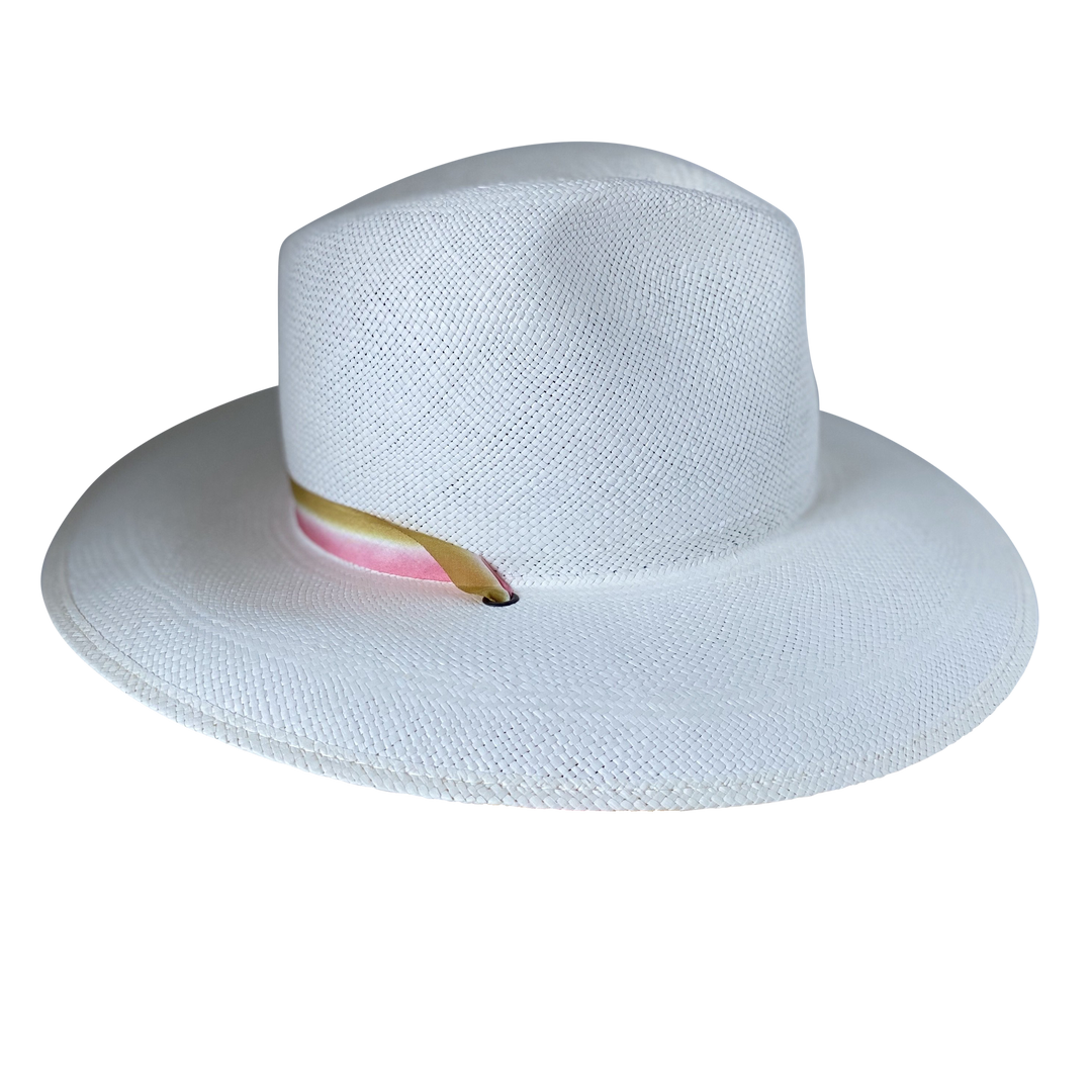 Khia Tullae The Margaux white toquilla straw wide-brim hat with a golden caramel and pastel pink silk ribbon half band, left-side product cutout