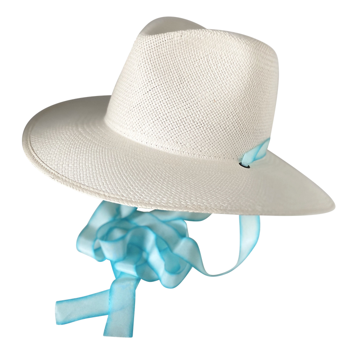 Khia Tullae The Montana white toquilla straw wide-brim hat with pastel blue and white silk drop-down ribbon, angled product cutout with ribbon detail
