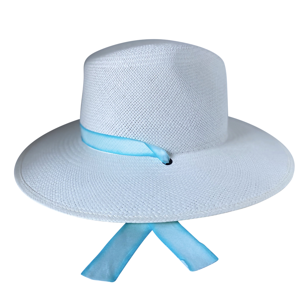 Khia Tullae The Montana white toquilla straw wide-brim hat with pastel blue and white silk drop-down ribbon, left-side product cutout