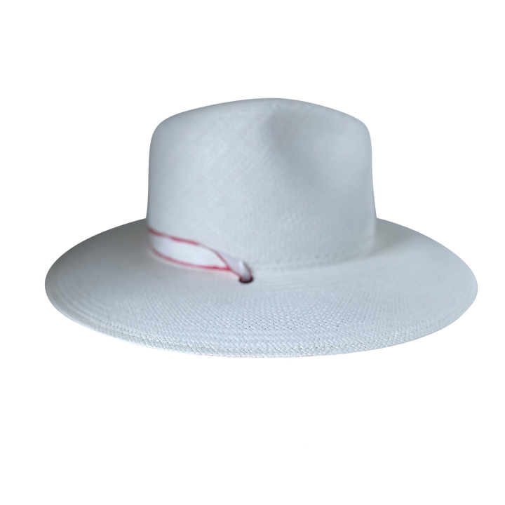 Khia Tullae The Morgan white toquilla straw wide-brim hat with a red tie-dye silk ribbon half band, left-side product cutout