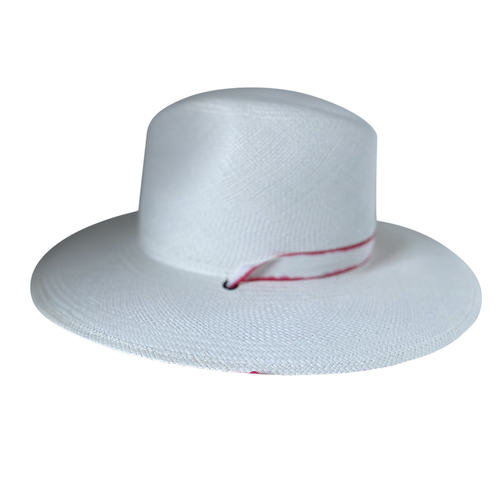 Khia Tullae The Morgan white toquilla straw wide-brim hat with a red tie-dye silk ribbon half band, right-side product cutout