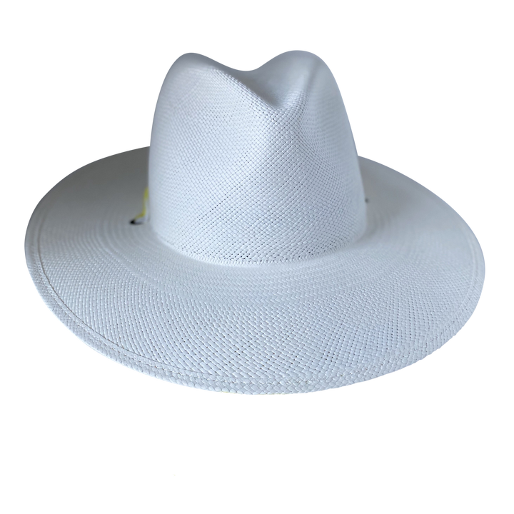 Khia Tullae The Siena white toquilla straw wide-brim hat with a pastel yellow tie-dye silk ribbon half band, front product cutout