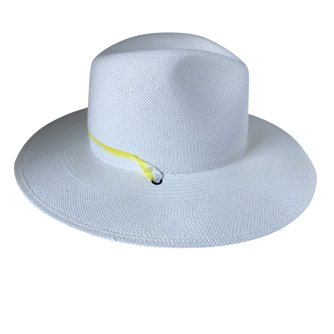 Khia Tullae The Siena white toquilla straw wide-brim hat with a pastel yellow tie-dye silk ribbon half band, left-side product cutout