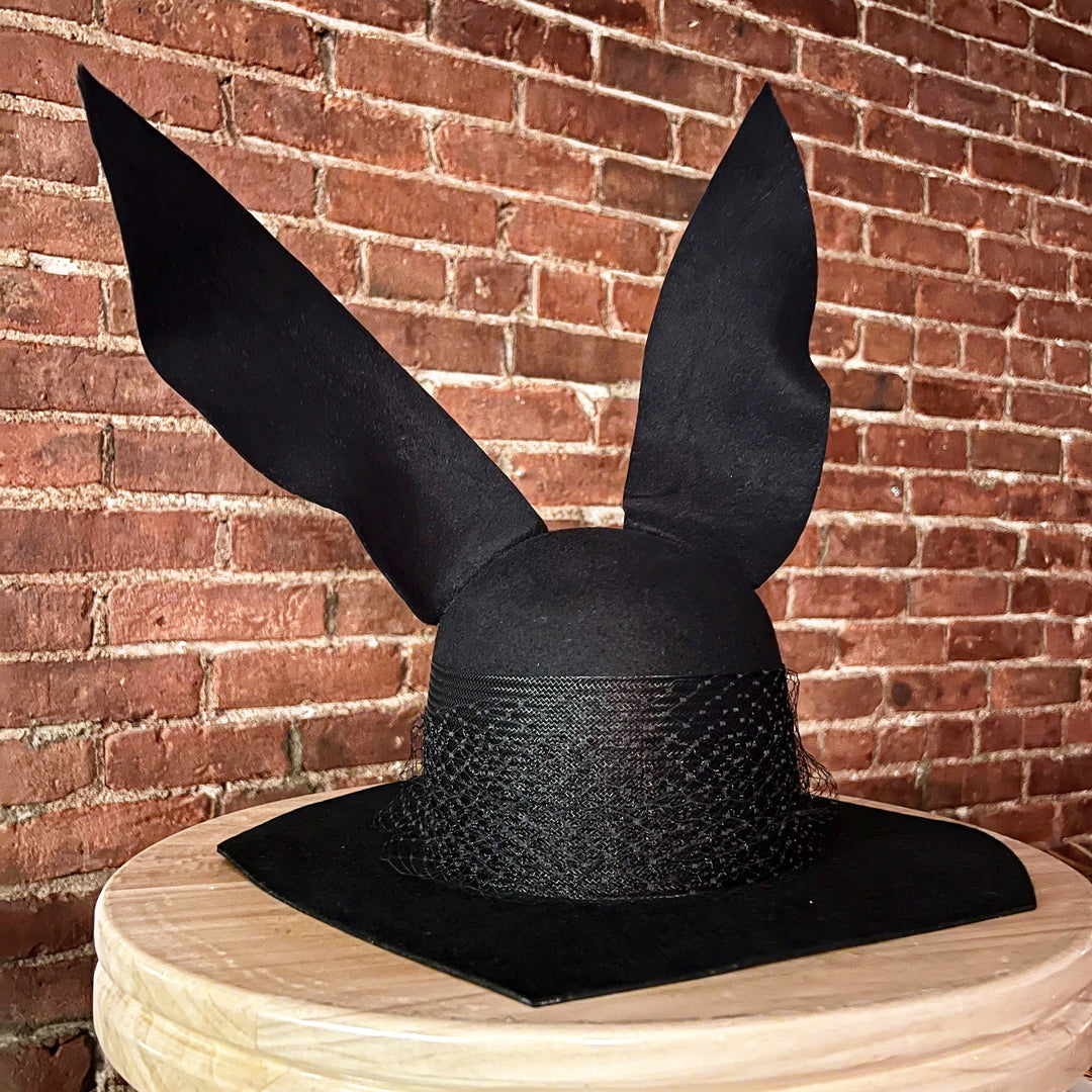 Khia Tullae The Tux Bunny Lid hat in black felt with a woven band, front view