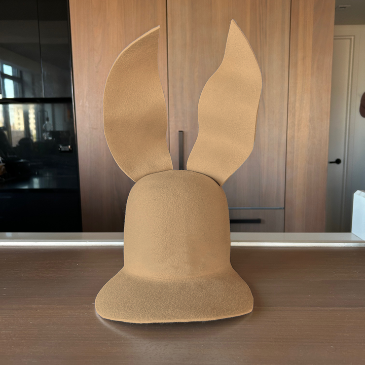 Khia Tullae Waved Bunny Lid hat in nude felt, front view